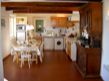 The huge Provençal style dining kitchen is big enough to seat 6 or 8 people for dinner. It combines the charm of an antique French farmhouse dresser with all the mod cons that you expect when you rent a luxury villa: dishwasher; washing machine; fridge; oven and microwave.